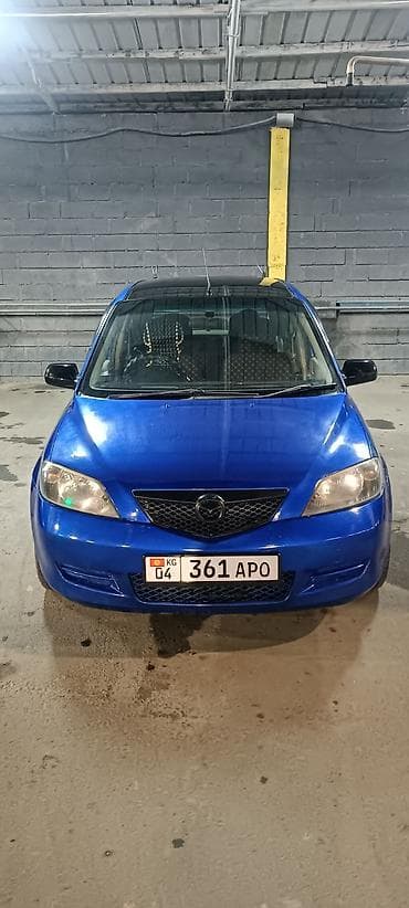 Продажа авто: Mazda Demio: 2003 г., 1.3 л, Автомат, Бензин, Хэтчбэк — 1