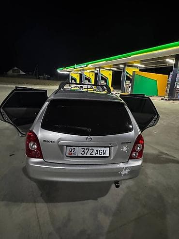 step rf3: Mazda 323: 2003 г., 1.6 л, Ручные, Бензин, Универсал — 10