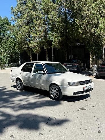 Продажа авто: Volkswagen Jetta: 2012 г., 1.6 л, Механика, Бензин, Седан — 2