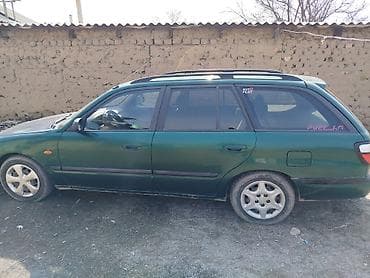 задняя балка гольф: Mazda 626: 1998 г., 1.8 л, Механика, Универсал — 1