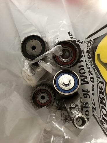 forester 2003: Б/у в отличном состоянии ГРМ оригинал ролики (4шт)от Subaru outback — 1