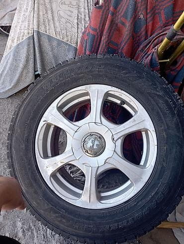 70: Комплект из 4 колес в сборе: литые диски + зимние шины Dunlop — 1