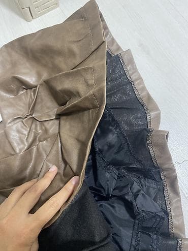 кожаные юбки: Женская кожаная юбка XL/2XL
не надевалась, с этикеткой, совсем новая — 3