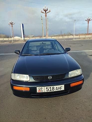 golf venta: Mazda 323: 1996 г., 1.6 л, Механика, Бензин, Седан — 1