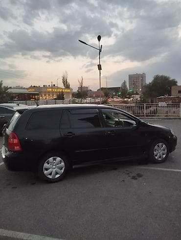 королла китайской сборки: Toyota Corolla: 2003 г., 1.8 л, Автомат, Универсал — 2