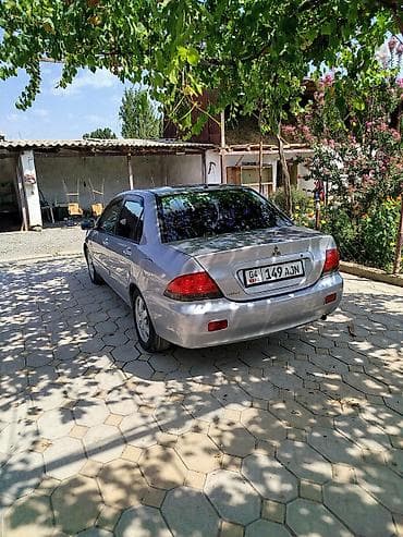 чери арризо 8 салон: Mitsubishi Lancer: 2006 г., Седан — 1