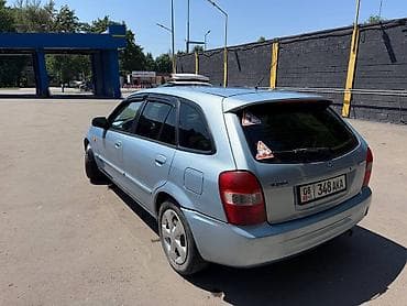 ford focus 2002: Mazda 323: 2001 г., 1.6 л, Автомат, Бензин, Хэтчбэк — 5