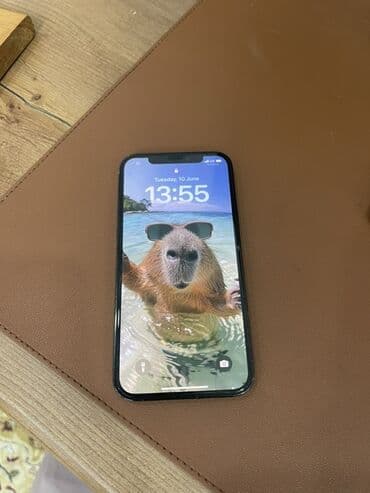 стоит компьютер: IPhone 12 Pro, 256 ГБ, Синий — 1