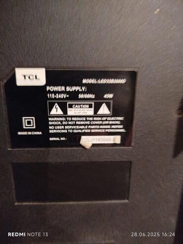 телевизор 32 дюйма цена: Телевизор TCL, модель LED32S3900. На задней панели имеются крепления — 3