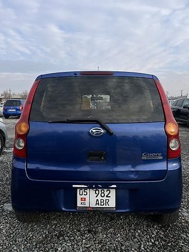дайхатцу мови: Daihatsu Cuore: 2009 г., 0.1 л, Механика, Бензин, Хэтчбэк — 2