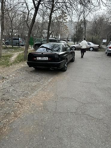 lexus rc: Купе чёрного цвета на киргизских номерах G1 193ATQ. Двухдверный кузов — 3