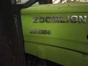 продаю связи с переездом: Трактор ZOOMLION RH1304 - Полноразмерный колесный трактор с кабиной — 4