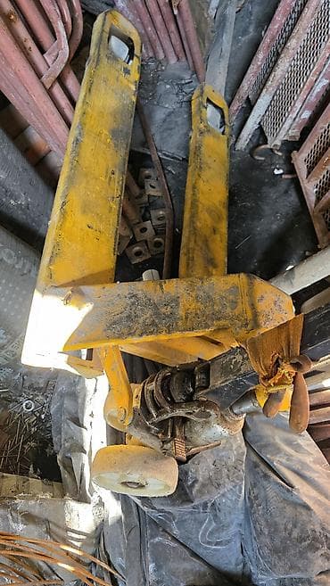 Рохля б/у рабочая. Ручная гидравлическая тележка желтая