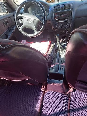 электронные мото: Mazda 626: 1998 г., 1.8 л, Ручные, Бензин, Универсал — 9