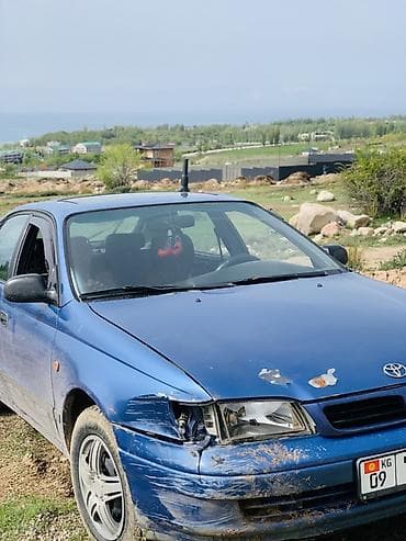 мицубиси спайс стар: Toyota Carina E: 1997 г., Седан — 4