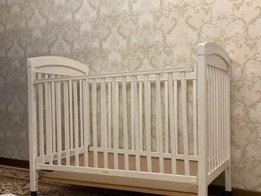 Graco Juniors - комфортный и функциональный манеж-кровать с разными