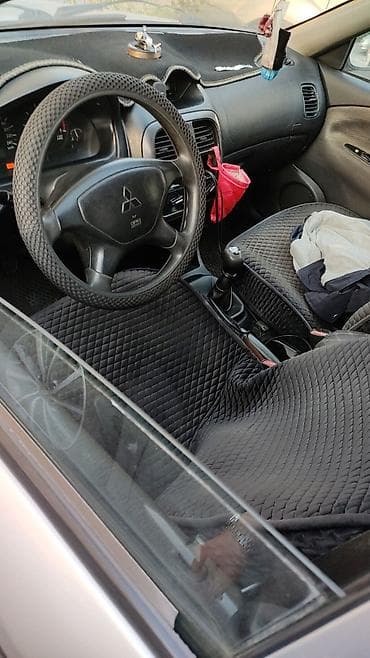 митцубиси каризма: Mitsubishi Carisma: 2001 г., 1.6 л, Механика, Седан — 5