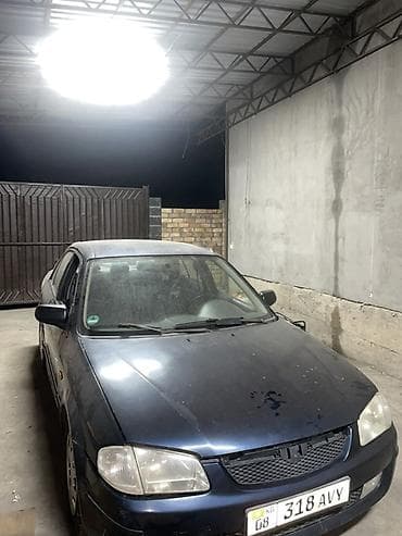 кузов нексия 2: Mazda 323: 1999 г., 1.6 л, Механика, Бензин, Седан — 6