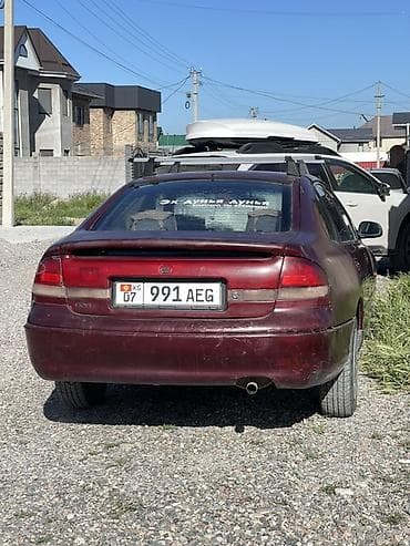 сед: Mazda 626: 1994 г., 2 л, Механика, Бензин, Седан — 2
