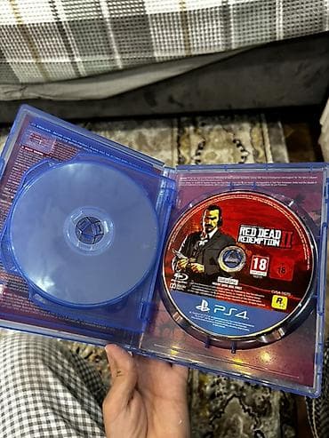 games: Игра Red Dead Redemption II для PlayStation 4 (версия на дисках — 4