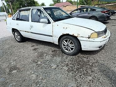 210 mers: Daewoo Nexia: 1996 г., 1.5 л, Механика, Бензин, Седан — 5