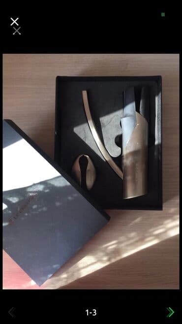 из серебра: Набор штопора для вина. От французской компании Le Creuset. Цвет — 2