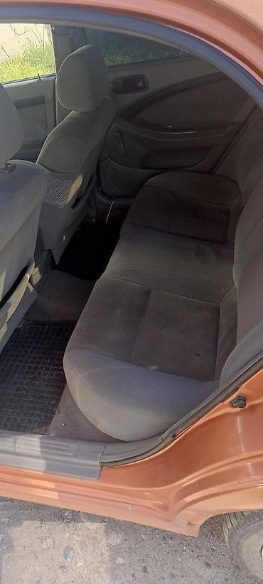 ford focus 2002: Chevrolet Lacetti: 2006 г., Механика, Бензин, Хэтчбэк — 5