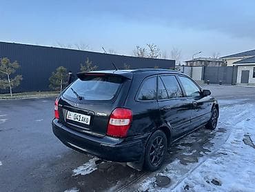 срочно мазда: Mazda 323: 2000 г., 1.8 л, Механика, Бензин, Универсал — 3