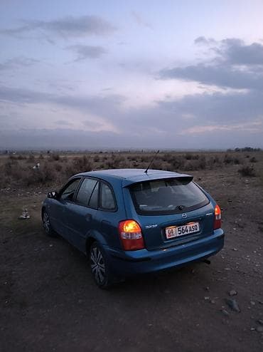 w124 124: Mazda 323: 1999 г., 1.5 л, Механика, Бензин, Универсал — 9