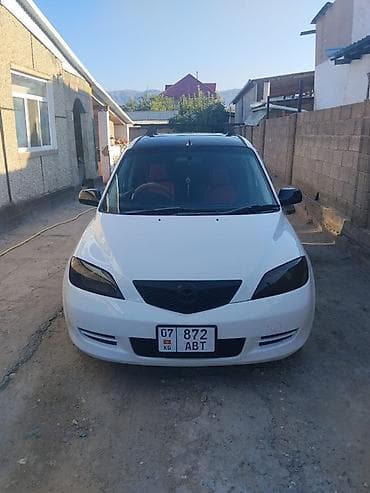 Транспорт: Mazda Demio: 2004 г., 1.3 л, Автомат, Бензин, Хэтчбэк — 1