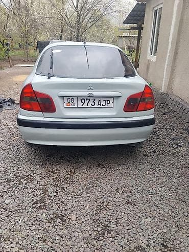 граната на мазду: Mitsubishi Carisma: 2002 г., 2 л, Ручные, Дизель, Седан — 6