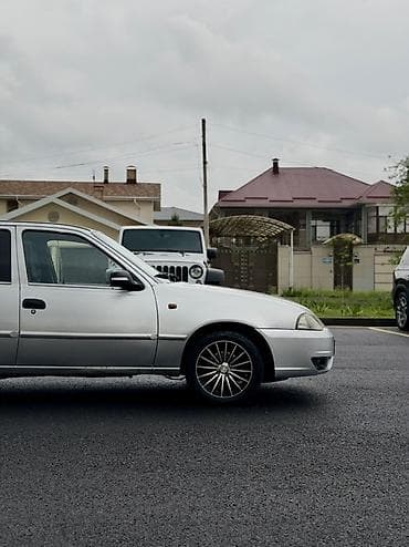 нехсия 2011: Daewoo Nexia: 2009 г., 1.5 л, Механика, Газ, Седан — 6