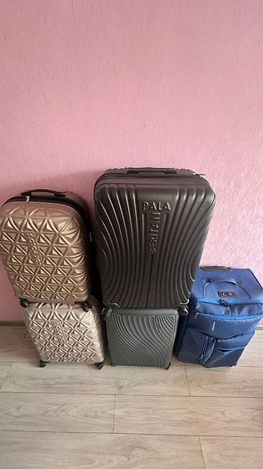 Чемоданы: Чемодан, Новый, Материал: Пластик, Средний (40 - 70 л), На колесах — 3