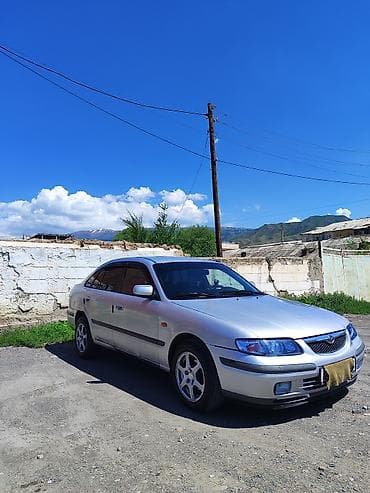 s class w220: Mazda 626: 1999 г., 1.8 л, Механика, Бензин, Хэтчбэк — 2