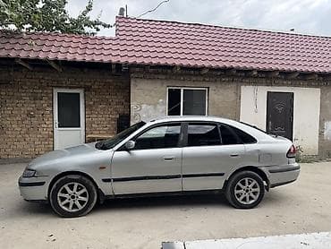 subaru авто: Mazda 626: 1999 г., 1.8 л, Механика, Бензин, Лифтбек — 4