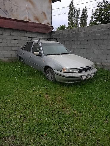 фара e34: Daewoo Nexia: 1998 г., Седан — 1