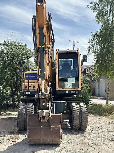 экскаваторы 140: Экскаватор, Hyundai, Колесный — 4