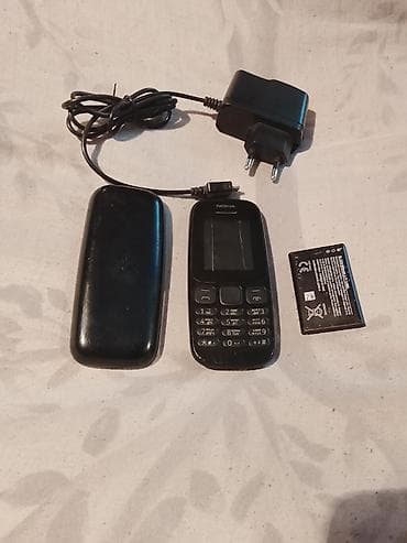 Кнопочный телефон Nokia с комплектом. Одам. за. 3.литра.масло