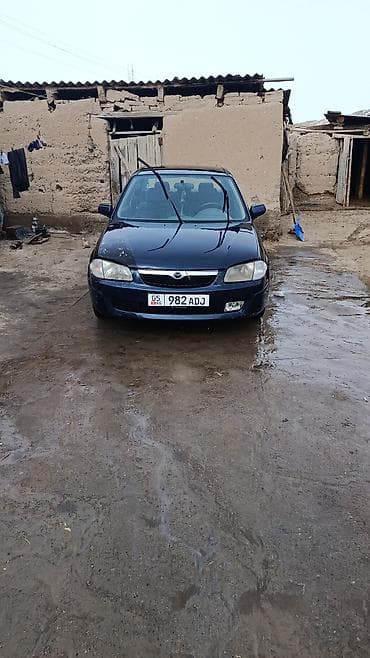 Mazda Familia: 2000 г., 1.5 л, Механика, Бензин, Седан — 2