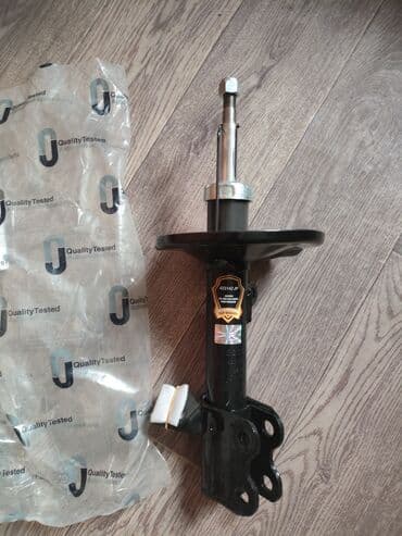 меняю доплатой мне: Передний амортизатор Toyota 2000 г., Новый, Оригинал, Япония — 1