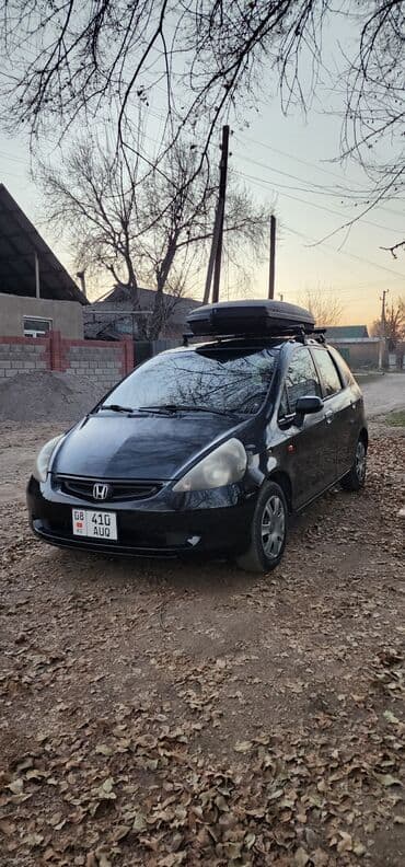 golf plus: Honda Jazz: 2002 г., 1.3 л, Механика, Бензин, Хэтчбэк — 2