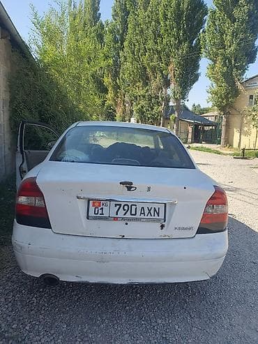 легенза: Daewoo Nubira: 2001 г., Механика, Бензин, Седан — 5