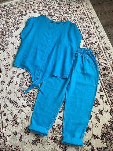 Брючные костюмы