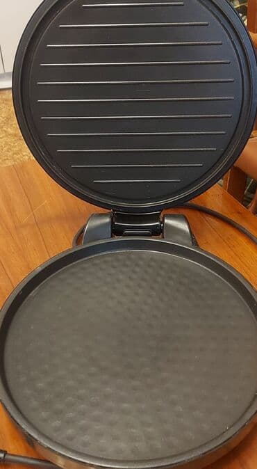 Кеңсе буюмдары: Мультипечь, вафельница НОВАЯ. 2500 сом.
Сковорода (Турция) 2500 — 1