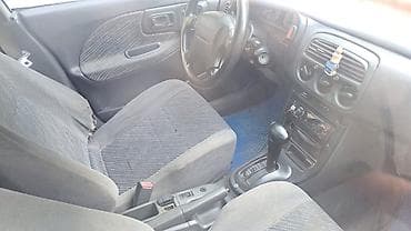 suba: Subaru Impreza: 1996 г., 2 л, Автомат, Седан — 6