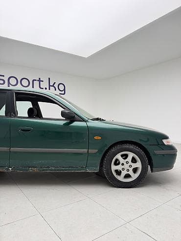 mazda d: Mazda 626: 1997 г., 1.8 л, Механика, Бензин, Седан — 10