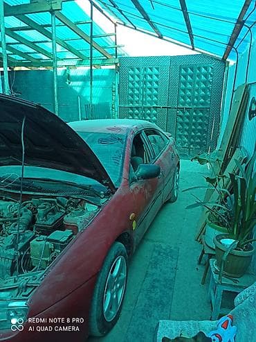 купить диски r15 4*100: Mazda 323: 1994 г., Механика, Бензин, Купе — 3