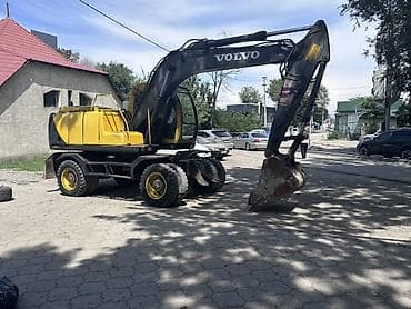 volvo ew160: Экскаватор, Volvo, 2001 г., Колесный — 2