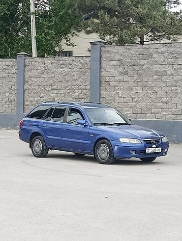 сткл: Mazda Capella: 2000 г., 1.8 л, Механика, Бензин, Универсал — 5