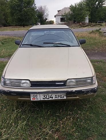 Mazda 626: 1994 г., 0.2 л, Механика, Бензин, Седан